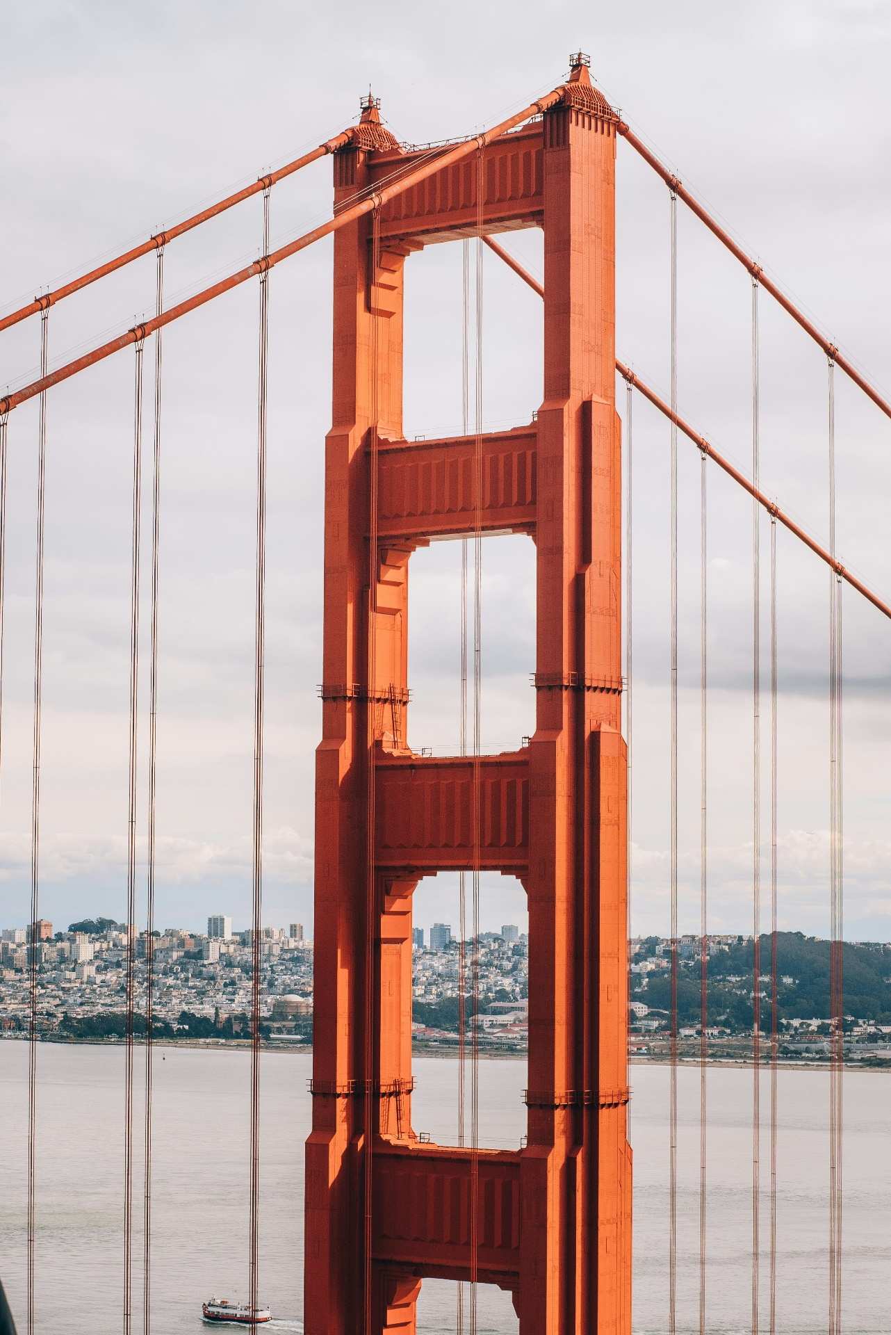 Golden Gate Bridge tower representing the gateway to American opportunity